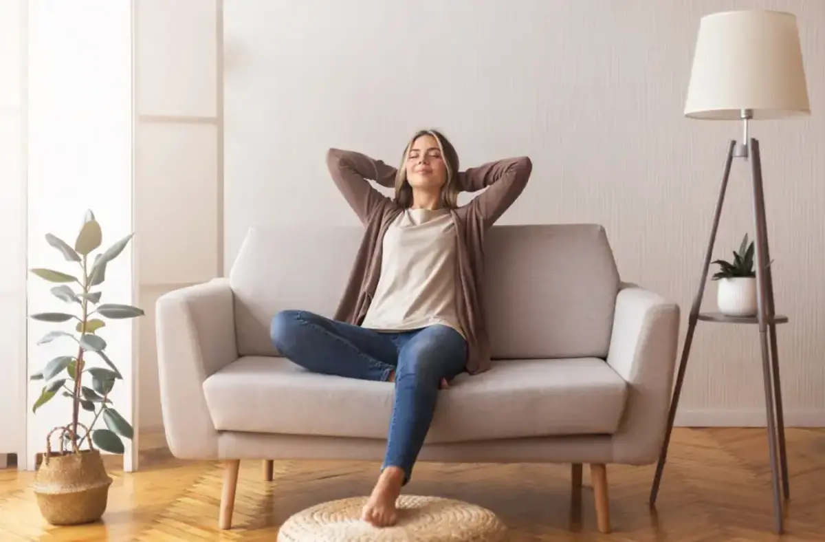 young woman relaxing in her living room