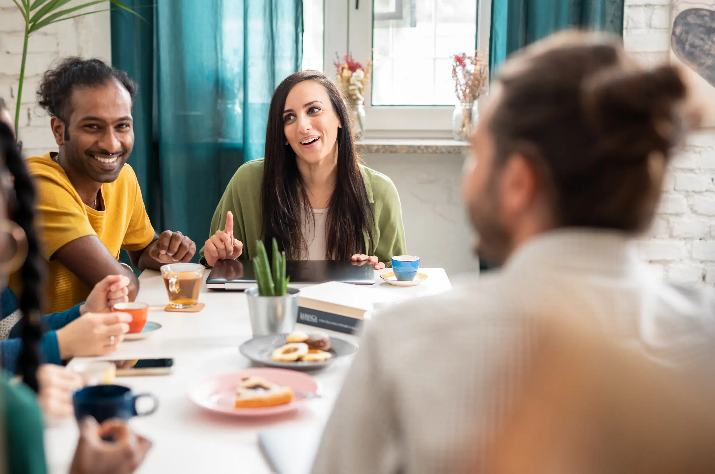 Group of multiracial friends laughing together