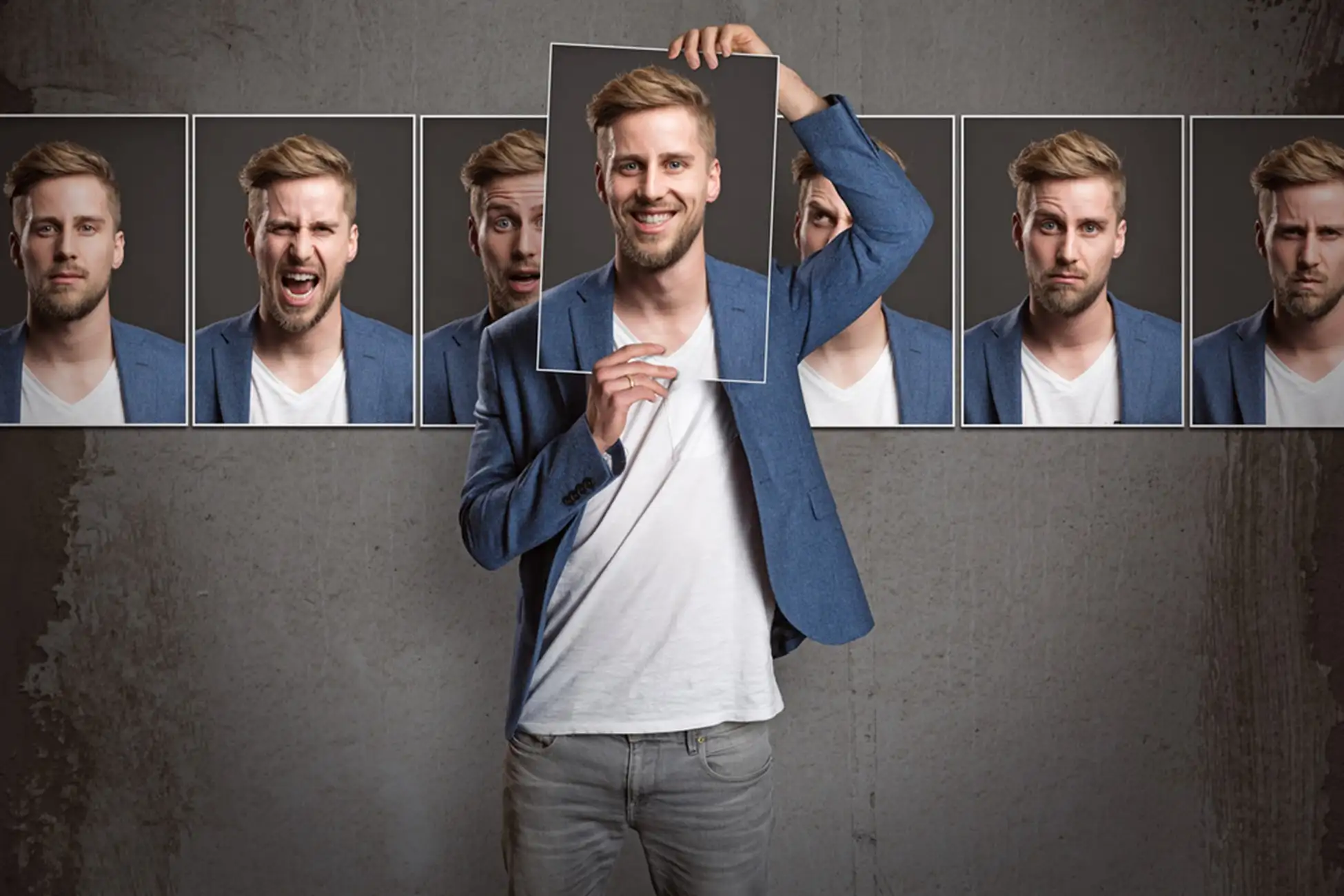 Man is holding his picture with other emotions