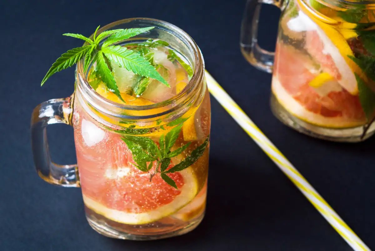 Two mason jars filled with watermelon and mint