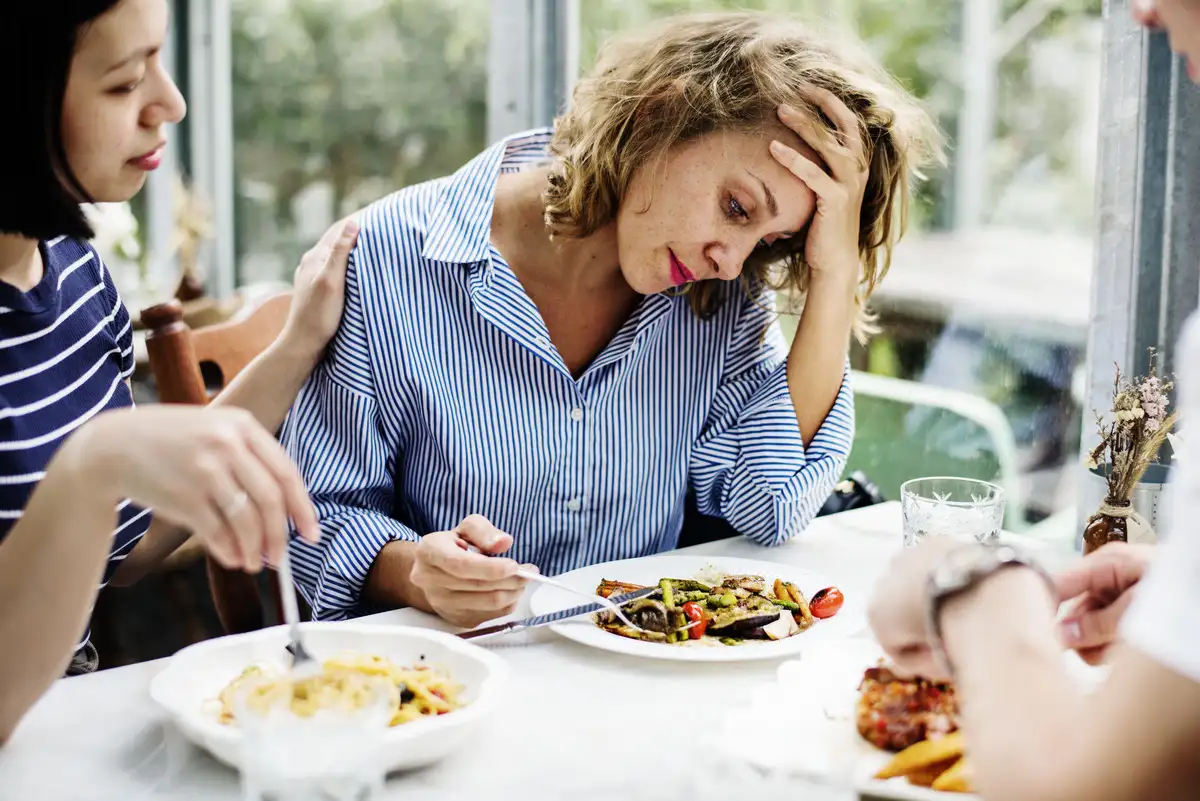 Woman having trouble eating