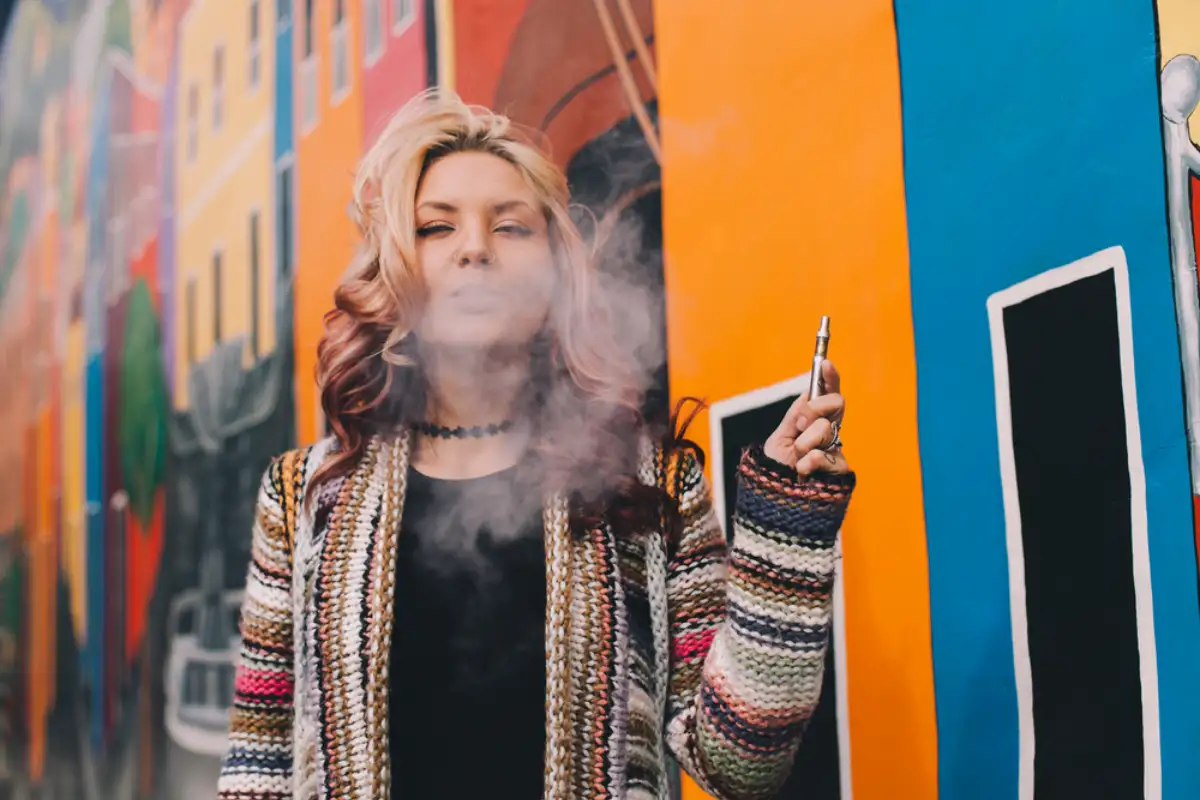 Woman smoking a cannabis vape